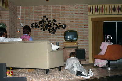 Spaceship Earth-family watching TV